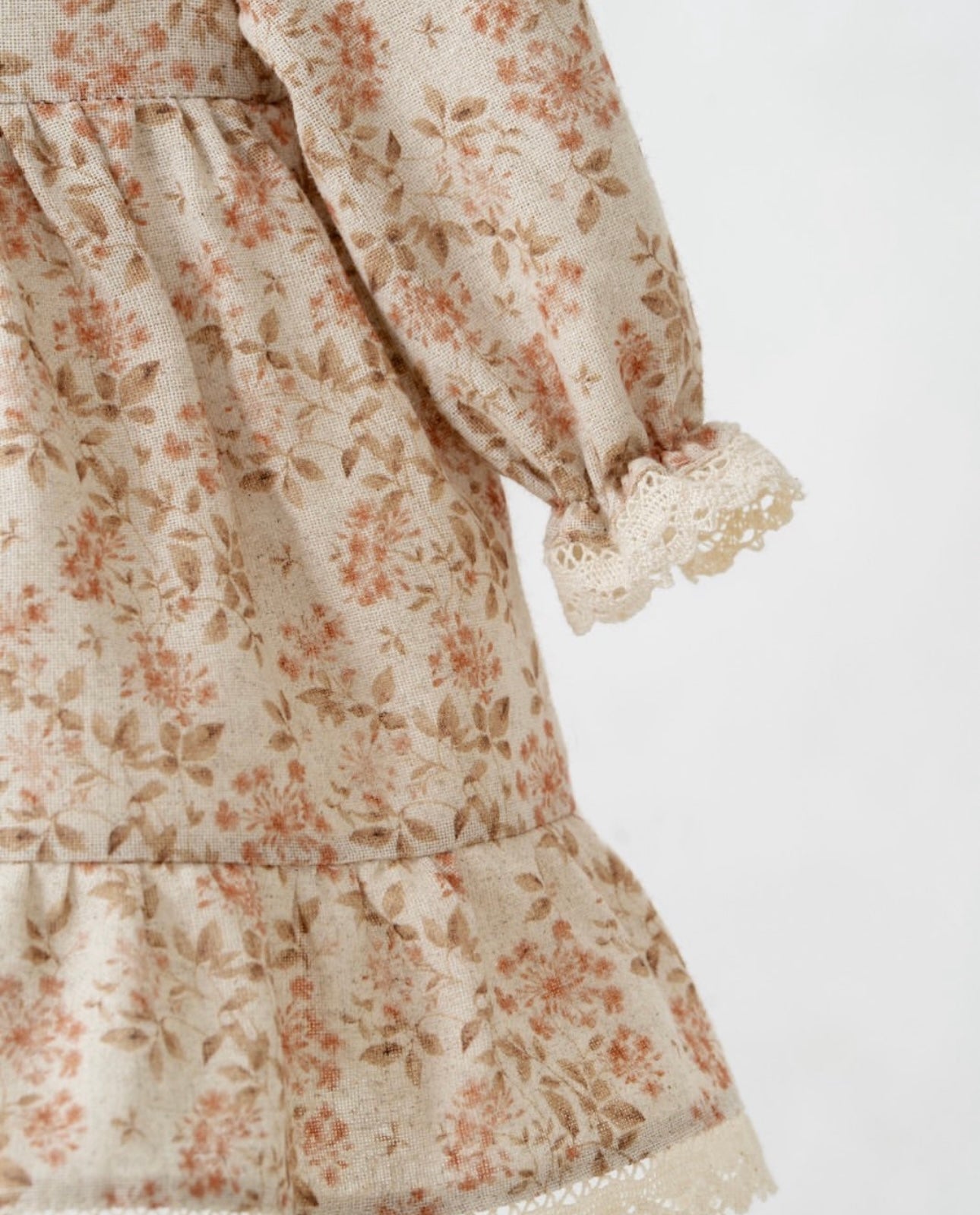 Vestito neonata floreale con colletto in pizzo