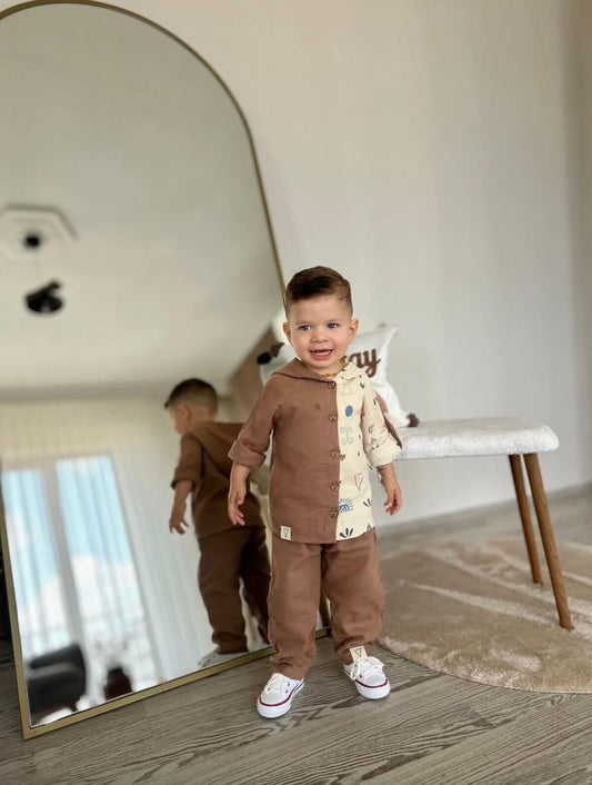 Completo bimbo camicia con cappuccio e pantaloni.