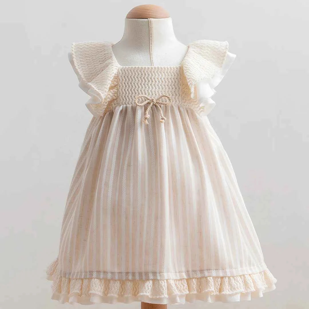 Abito neonata con smock e balze in pizzo