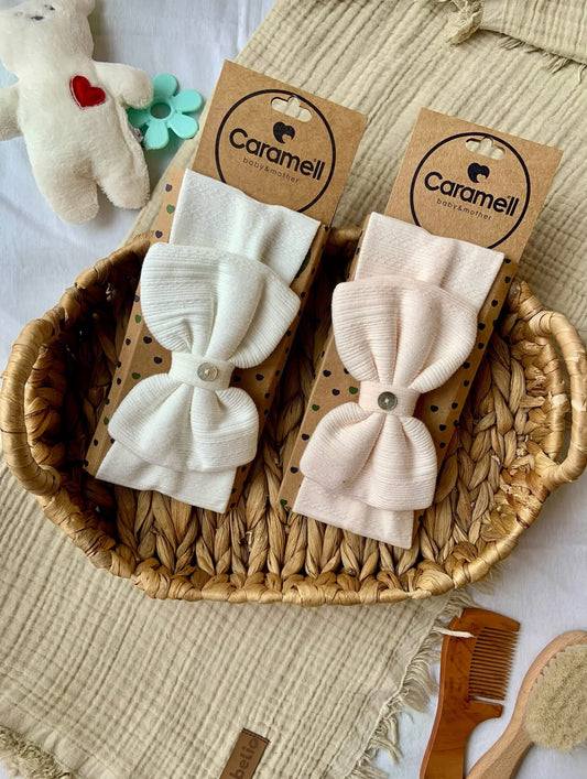 Fascia per capelli neonata con fiocco